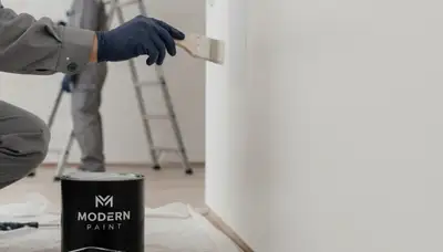 Durham, NC painter fixing wall scuffs and chips with professional paint touch-up service